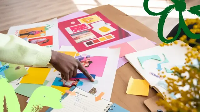 Creative moodboard spread on a table with colorful product layouts and brand assets