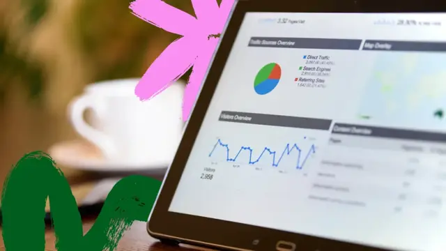 Tablet showing traffic analytics and campaign performance data